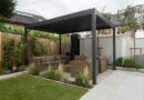 a patio with a couch and a table in it