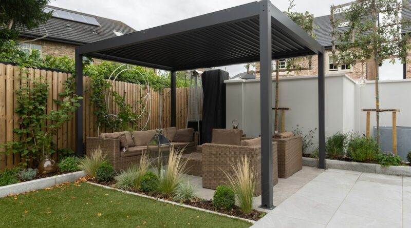 a patio with a couch and a table in it